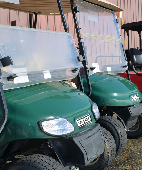 Christians Carts Green EZGO golf cart front angle view